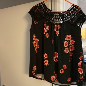 Maurice’s blouse black with red and pink. Excellent condition.